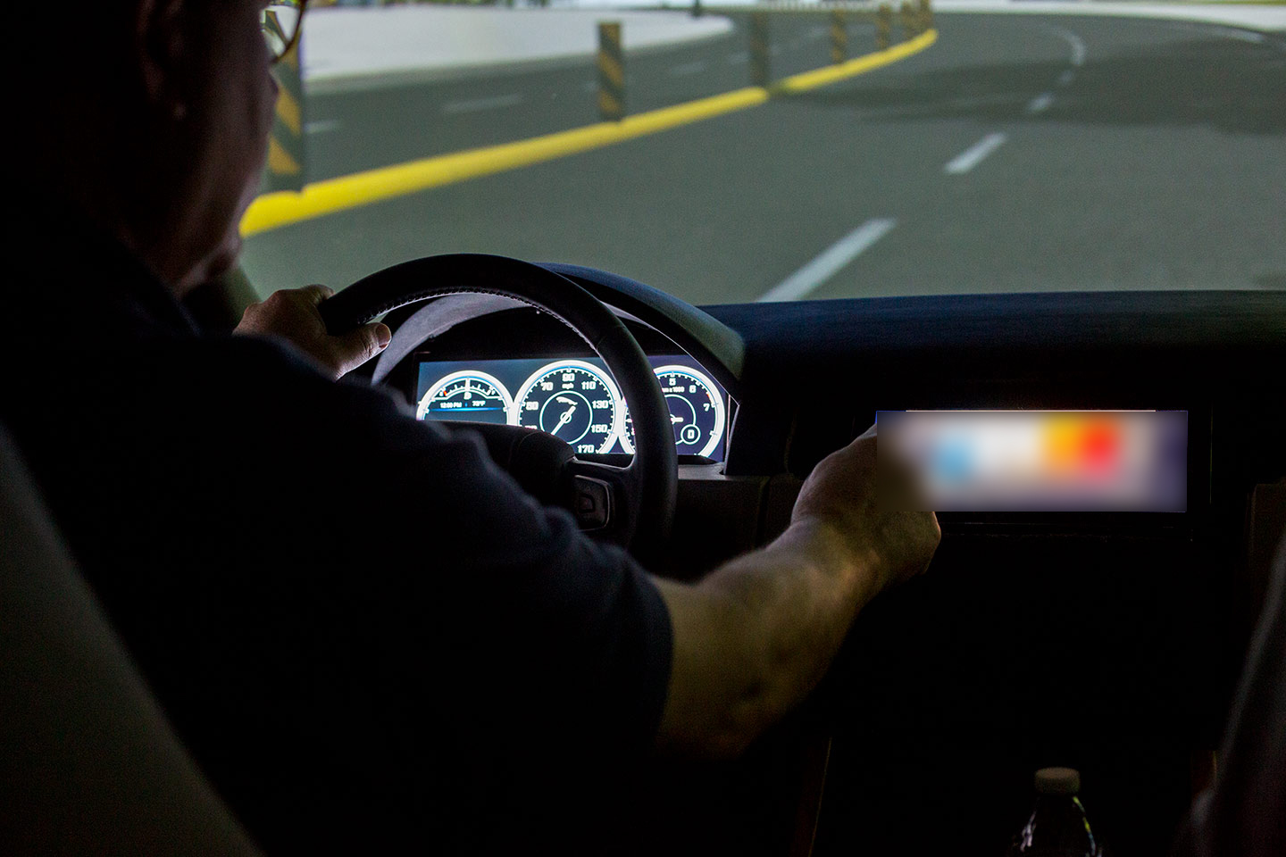 A participant in a simulated driving user test